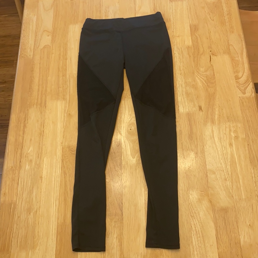 Women’s black leggings with mesh